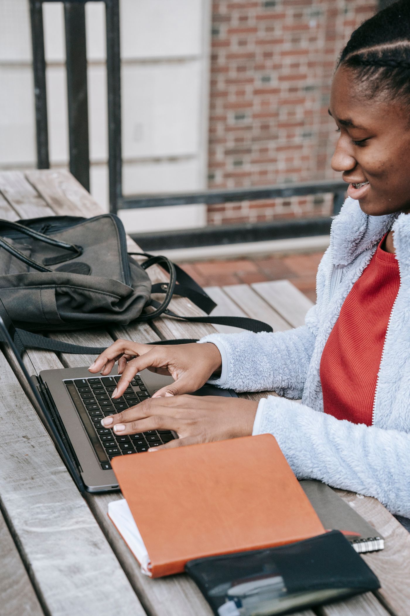 A young woman learning on her laptop